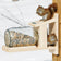Duncraft Squirrel Jar Feeder on a post, with two squirrels accessing seeds from the inverted jar, showcasing its engaging design and easy squirrel entry.