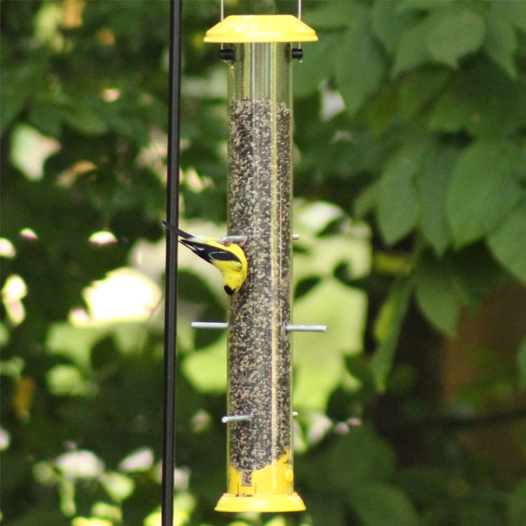 Nature's Way Bottoms Up Metal Thistle Finch Bird Feeder with a goldfinch feeding, features dual-direction seed ports and a durable, easy-clean design.